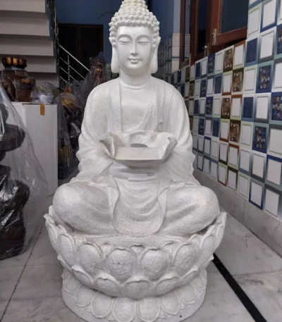 Buddha fountain lotus meditating